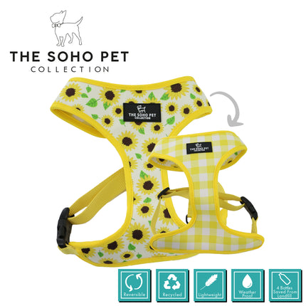 Two dog harnesses with sunflower pattern and checkered pattern on a white background, branded as 'The Soho Pet Collection'.