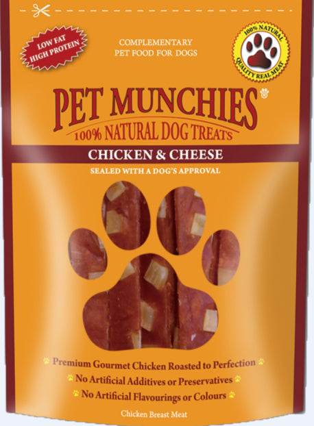 Packaging of PET MUNCHIES brand premium gourmet chicken roasted to perfection, showing the product as chicken and cheese flavored dog treats, with an image of a dog's paw print.